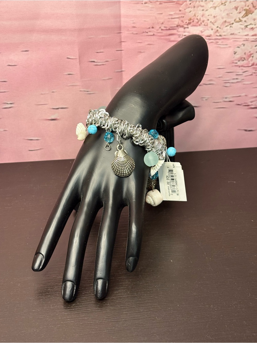 Hannah Accents silver tone stretch charm bracelet seashell pendants blue. NWT